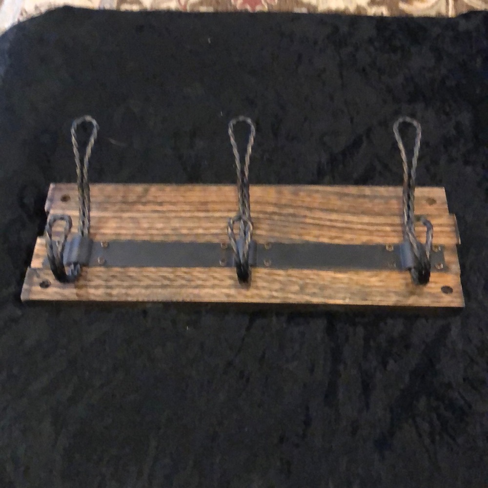 Rustic wooden boards with hooks